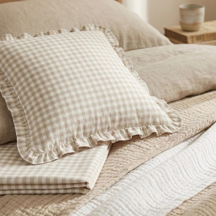 Cushion cover in vichy check with a handmade ruffled edge