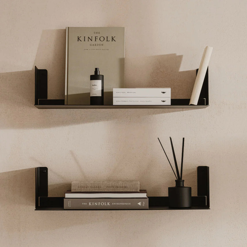 Floating wall shelf in stainless steel with no visible bracket