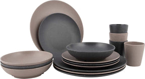 Sixteen piece dinner set in beige and dark grey, plates bowls and tumblers stacked