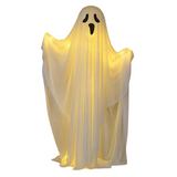 Standing white fabric ghost glowing from inside
