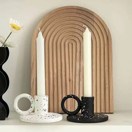 Two resin candle holders with a splash ink pattern