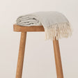 Grey Haze throw with a fringed edge
