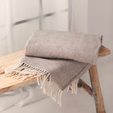 Brown Haze throw with a fringed edge
