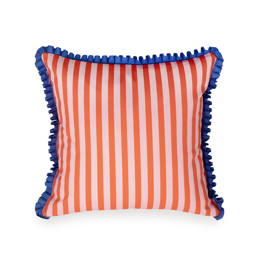 Cushion cover with fine warm-toned stripes and a deep blue ruffle