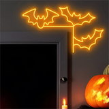 Orange neon bat sign glowing above a doorway