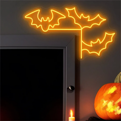 Orange neon bat sign glowing above a doorway
