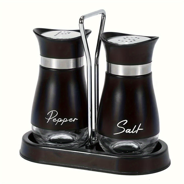 Black salt and pepper shakers on a black stand with a chrome handle