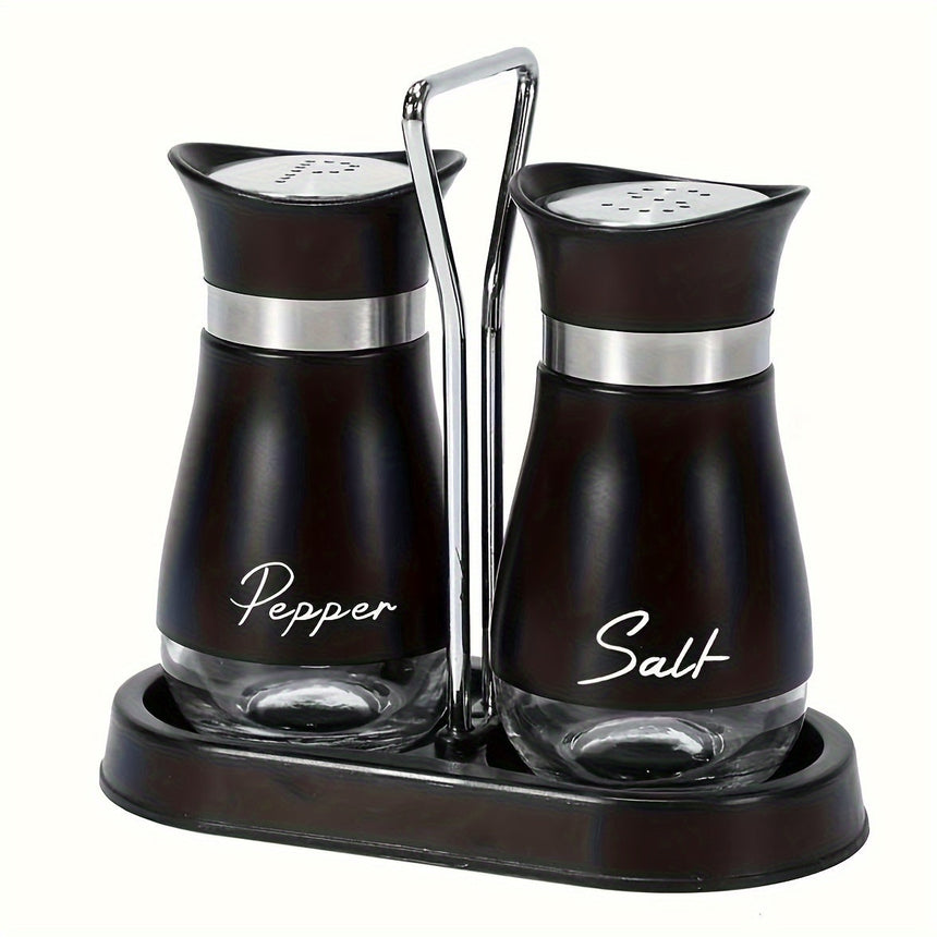 Black salt and pepper shakers on a black stand with a chrome handle