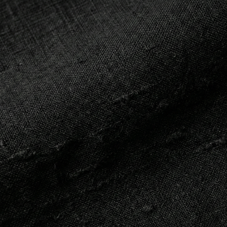 Close-up of the linen-cotton weave in black, a second detail of the fabric texture