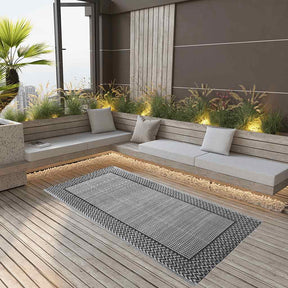 Arakil rectangular outdoor rug in grey, 120 by 180 cm