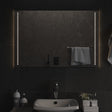 A rectangular bathroom mirror in portrait format with integrated LED lighting