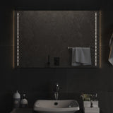 A rectangular bathroom mirror in portrait format with integrated LED lighting