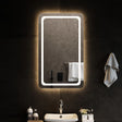A tall rectangular bathroom mirror, a metre high, lit by an integrated LED strip