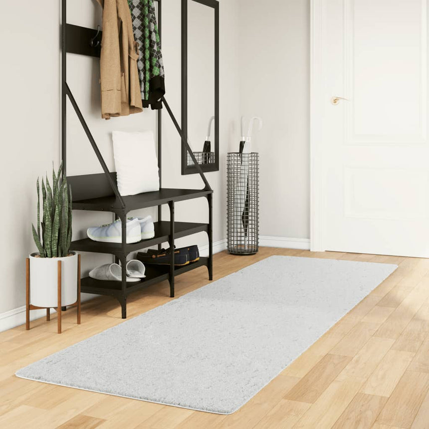 Gray low-pile runner rug