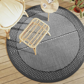 Round gray outdoor rug