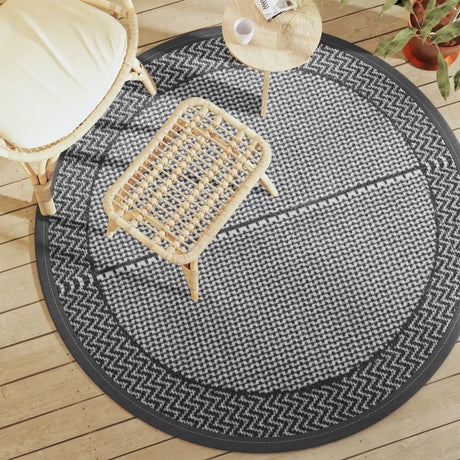 Round gray outdoor rug