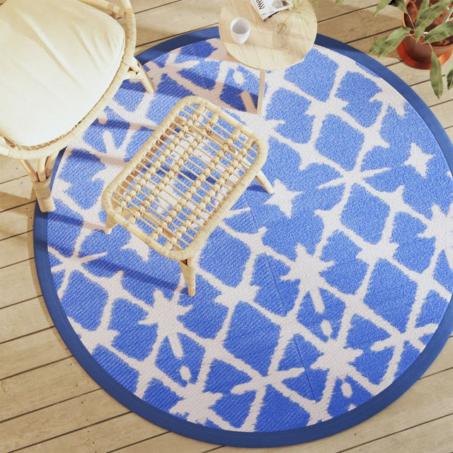 Arakil round outdoor rug in blue and white, 160 cm