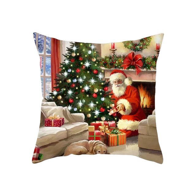 Cushion cover printed with a lit Christmas tree, Santa and a fireplace