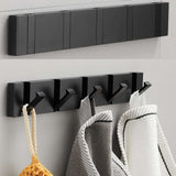 Wall-mounted coat rack in black metal