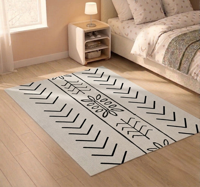 Off-white vinyl rug with black chevron and leaf motifs in a bedroom