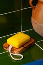 Olive wood soap dish cut from a single piece, showing natural grain