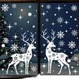 White elk and snowflake Christmas stickers on a dark window