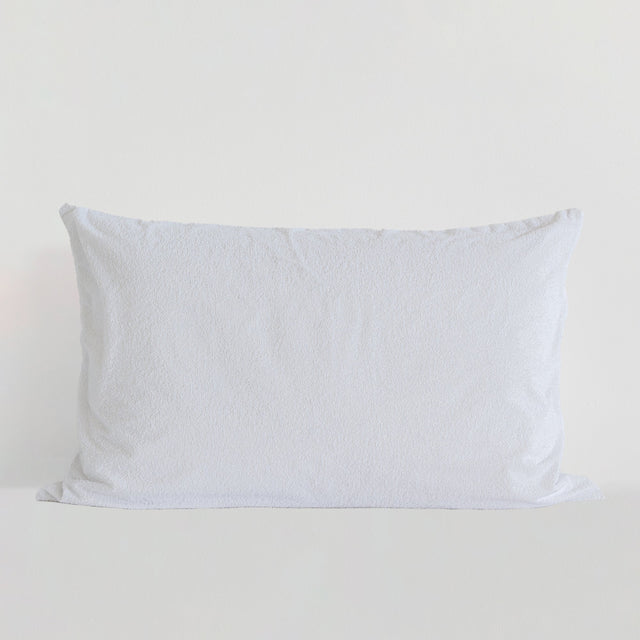 White cotton terry waterproof pillow protector with a zip
