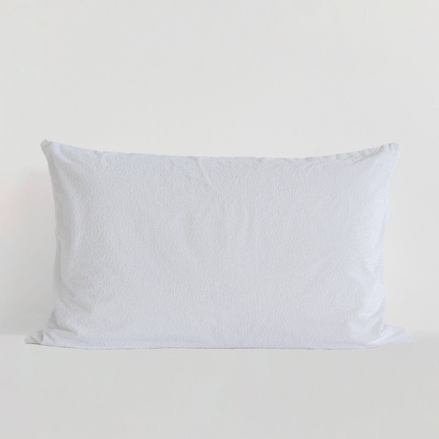 White cotton terry waterproof pillow protector with a zip