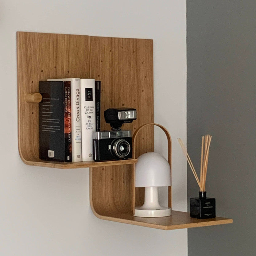 Floating wall shelf in curved plywood