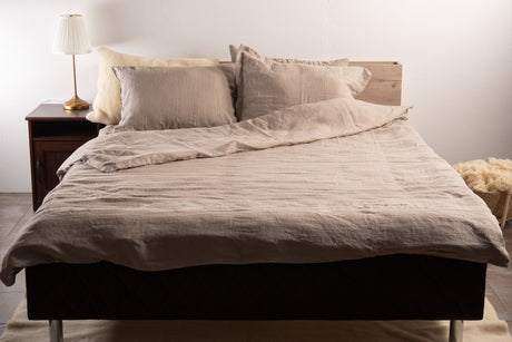 Stonewashed natural linen duvet cover on a bed