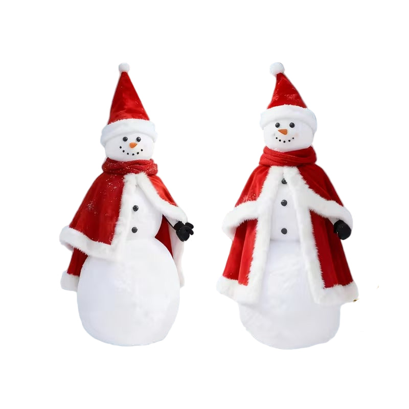 Two snowman decorations in red Santa hats and red capes