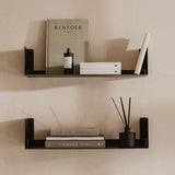 Floating wall shelf in stainless steel with no visible bracket