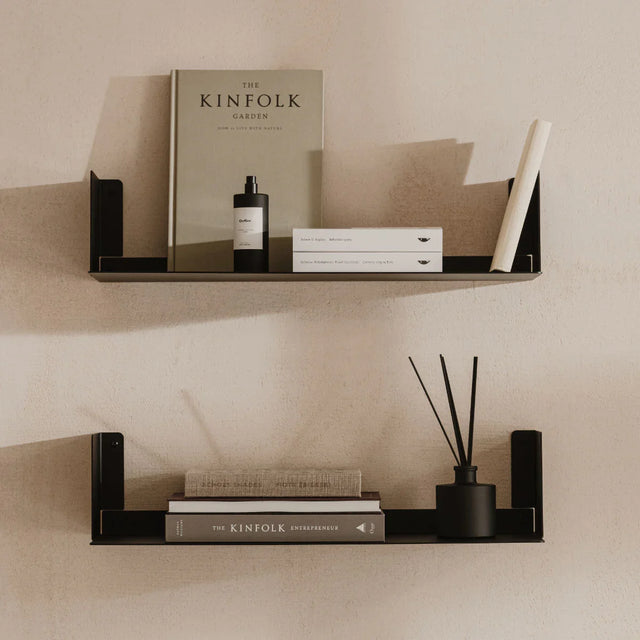 Floating wall shelf in stainless steel with no visible bracket