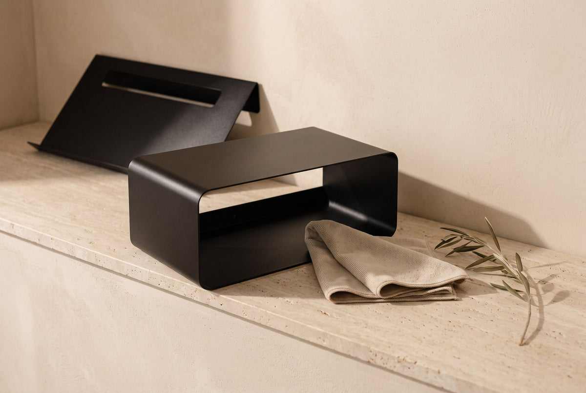 Black powder-coated metal shelf bracket and rack wiped clean with a soft cloth