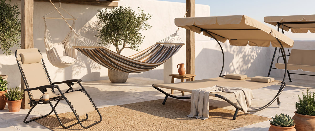 Mediterranean terrace with a striped hammock, zero-gravity loungers, a canopy sun bed and a hanging chair