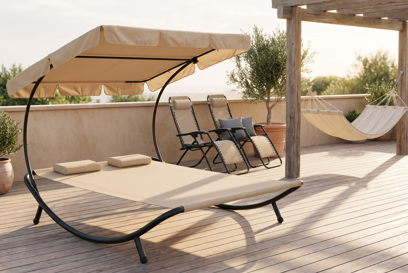 Two-person sun lounger, zero-gravity chairs and a hammock on a terrace under a pergola