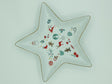 Star-shaped white porcelain tray printed with Christmas motifs