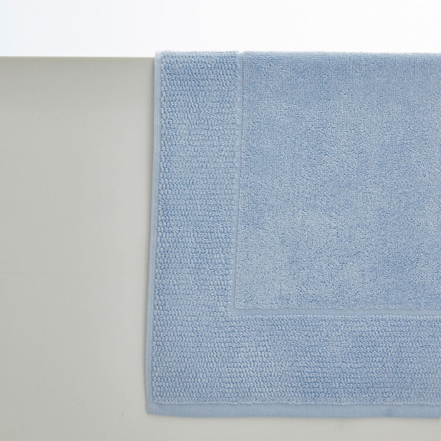 Light blue bath mat